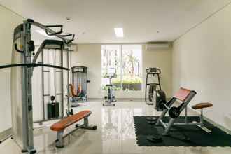 Fitness Center 4 2BR Simply Furnished at Puri Orchard Apartment By Travelio