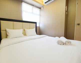 Kamar Tidur 2 2BR Homey and Comfy at Kalibata City Apartment By Travelio