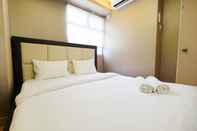 Bilik Tidur 2BR Homey and Comfy at Kalibata City Apartment By Travelio