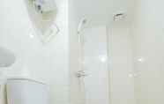 Toilet Kamar 6 2BR Spacious Apartment at The Springlake Summarecon Bekasi By Travelio