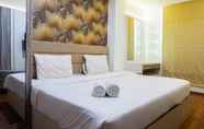 Bedroom 4 1BR Premium Apartment at Grand Sungkono Lagoon By Travelio