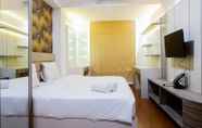Bedroom 2 1BR Premium Apartment at Grand Sungkono Lagoon By Travelio