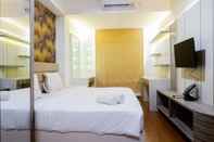 Bedroom 1BR Premium Apartment at Grand Sungkono Lagoon By Travelio