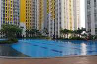Swimming Pool 2BR Nice at Springlake Summarecon Bekasi Apartment By Travelio