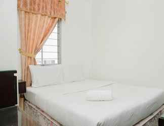 Bedroom 2 2BR Classic and Warm Gading Mediterania Apartment By Travelio
