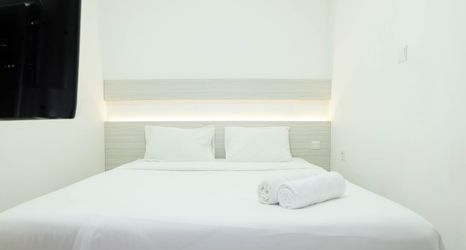 Bedroom 2 1BR Cozy at Signature Park Grande Apartment near MT Haryono By Travelio