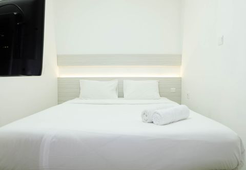 Bedroom 1BR Cozy at Signature Park Grande Apartment near MT Haryono By Travelio