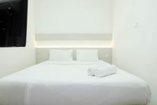 Bedroom 1BR Cozy at Signature Park Grande Apartment near MT Haryono By Travelio