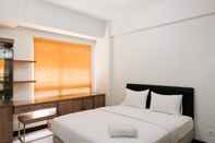 Kamar Tidur Studio Cozy with City View at Scientia Apartment By Travelio