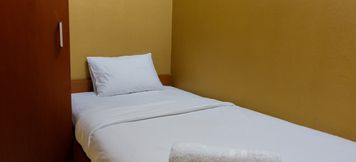 침실 5 2BR Exclusive Green Lake View Apartment By Travelio