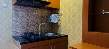 침실 2 2BR Exclusive Green Lake View Apartment By Travelio