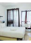 BEDROOM Studio near Bella Terra Mall at Tifolia Apartment By Travelio