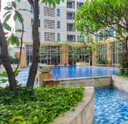 Swimming Pool 2 1BR Strategic Casa Grande Apartment near Kota Kasablanka Mall By Travelio