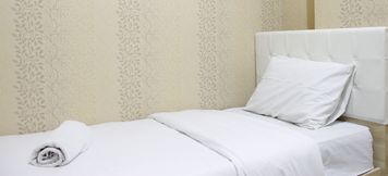 침실 2 2BR Classic Apartment at Mekarwangi Square Cibaduyut By Travelio