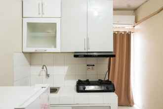 Bilik Tidur 4 2BR Warm Apartment Cibubur Village By Travelio