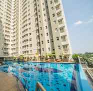 Swimming Pool 3 2BR Quiet Apartment at Parahyangan Residance Apartement with Mountain View By Travelio