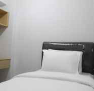 Bedroom 2 Young and Trendy 2BR Kalibata City Apartment By Travelio