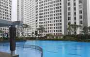 Swimming Pool 6 Studio Comfy Apartment with Extra Bed at M-Town Residence By Travelio