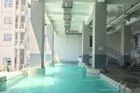 Swimming Pool Studio Cozy Apartment Easton Park Residence Jatinangor By Travelio