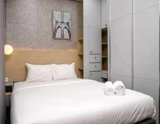 Bilik Tidur 2 1BR Cozy at Puri Orchard Apartment By Travelio