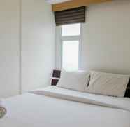 Bedroom 5 1BR Minimalist at Akasa Pure Living Apartment By Travelio