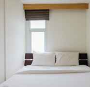 Bedroom 4 1BR Minimalist at Akasa Pure Living Apartment By Travelio