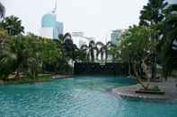 Kolam Renang 1BR Nice Apartment at Thamrin Residence By Travelio