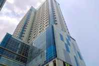 Bangunan 1BR Homey Apartment at Atlanta Residance By Travelio