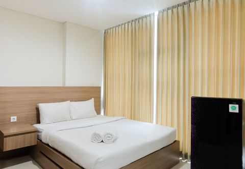 Bedroom Cozy Studio Room Apartment at Brooklyn Alam Sutera By Travelio
