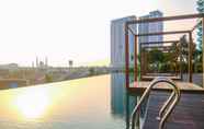 Kolam Renang 3 Cozy 1BR Apartment at Grand Kamala Lagoon By Travelio