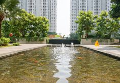 Kolam Renang 4 2BR Clean and Cozy at Green Bay Apartment By Travelio