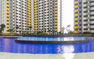 Swimming Pool 4 Clean 2BR Apartment at Springlake Summarecon Bekasi By Travelio