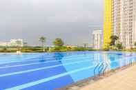 Swimming Pool Clean 2BR Apartment at Springlake Summarecon Bekasi By Travelio
