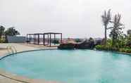 Swimming Pool 4 Studio Affordable Price Apartment at Grand Kamala Lagoon By Travelio
