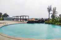 Swimming Pool Studio Affordable Price Apartment at Grand Kamala Lagoon By Travelio
