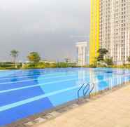 Swimming Pool 2 Studio Homey at Springlake Summarecon Bekasi Apartment By Travelio