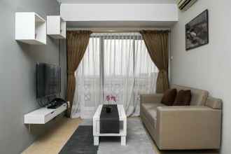 Ruang Umum 4 Spacious 2BR Puri Garden Apartment By Travelio