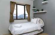 Bedroom 2 Spacious 2BR Puri Garden Apartment By Travelio