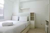 Bedroom 2BR Modern White Kalibata City Apartment By Travelio