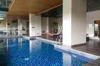 Swimming Pool 1BR Elegant Kemang Village Apartment By Travelio