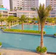 Hồ bơi 2 2BR Wonderful at Gold Coast Apartment Pantai Indah Kapuk By Travelio