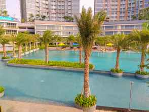 Swimming Pool 4 2BR Wonderful at Gold Coast Apartment Pantai Indah Kapuk By Travelio