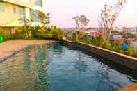 Swimming Pool Comfy Studio Room Apartment at Grand Kamala Lagoon By Travelio