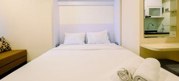 Bedroom 4 Studio Unique Room with Multifunction Bed Grand Kamala Lagoon Apartment By Travelio