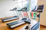 Fitness Center Studio Tifolia Apartment with Double Bed near LRT Station By Travelio