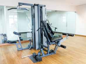Fitness Center 4 Studio Tifolia Apartment with Double Bed near LRT Station By Travelio
