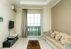 Common Space 2 1BR Comfy at Belleza Apartment By Travelio