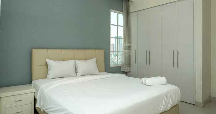 Bedroom 1BR Comfy at Belleza Apartment By Travelio