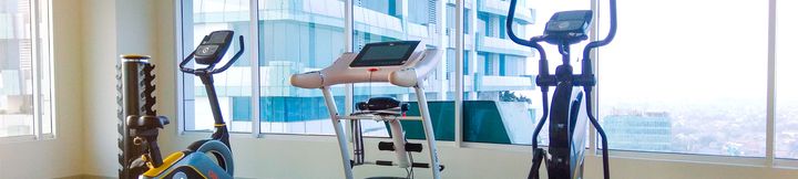 Fitness Center 3 2BR Modern Grand kamala Lagoon Apartment By Travelio