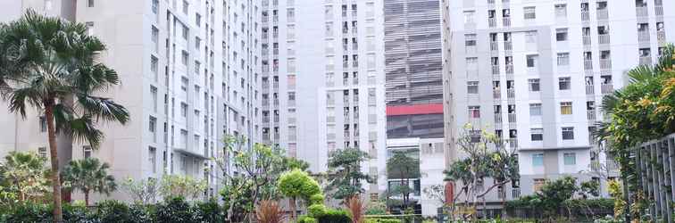 Lobby 2BR Apartment at Green Bay Pluit By Travelio